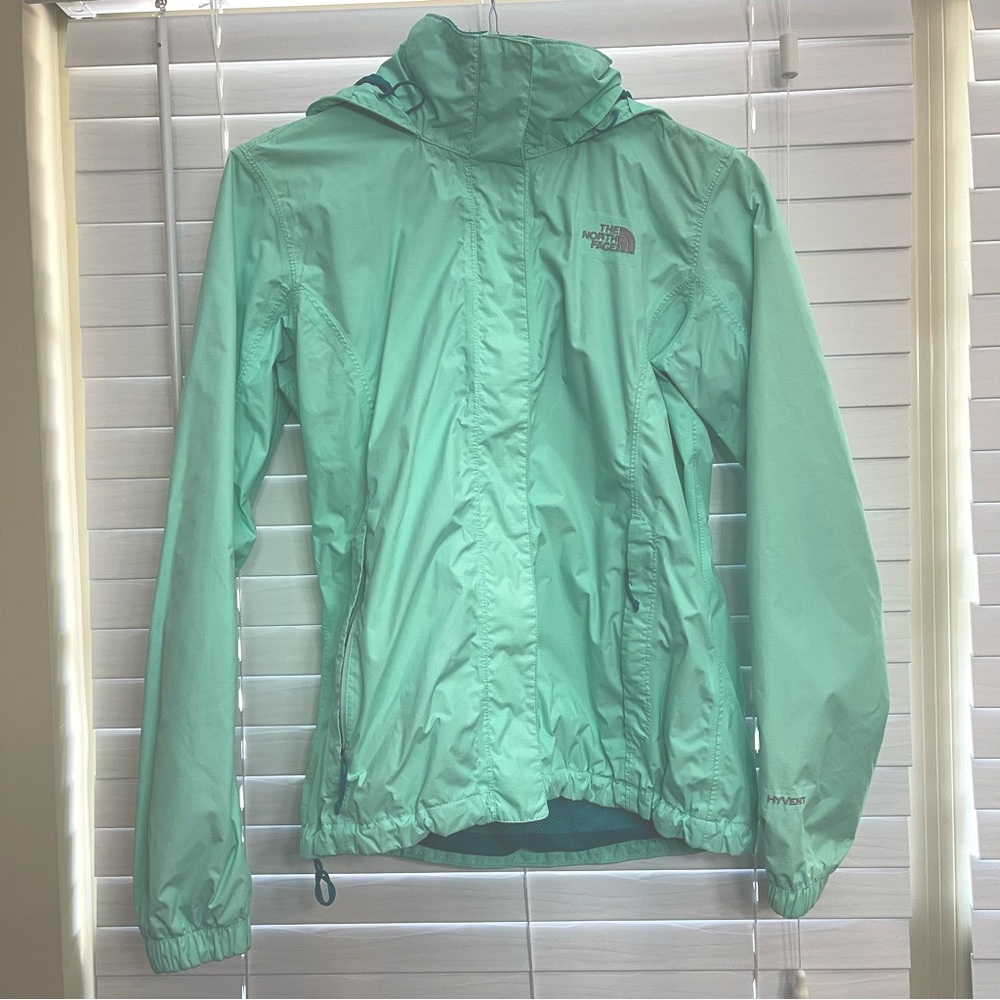 The North Face Women’s aqua + turquoise Hyvent rain jacket